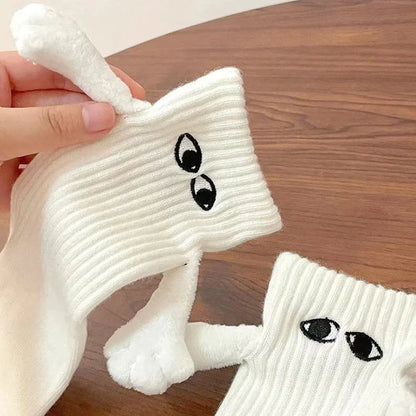 Hand Holding Socks